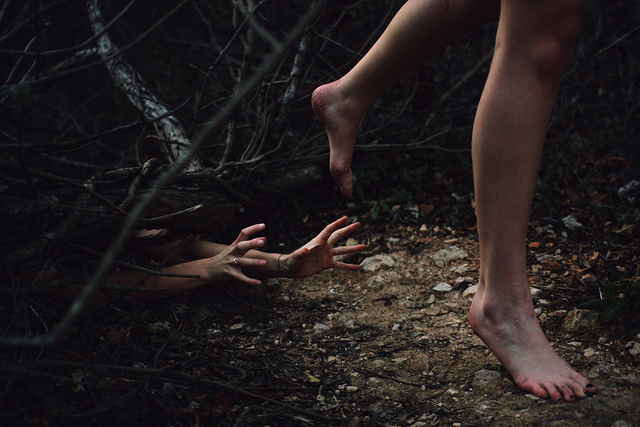 barefoot runner running from zombie