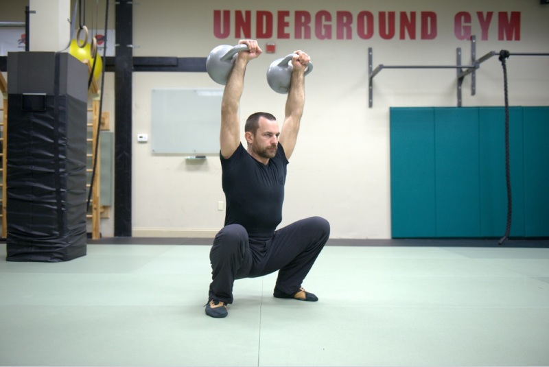 greg mihovich overhead squat with kettlebells