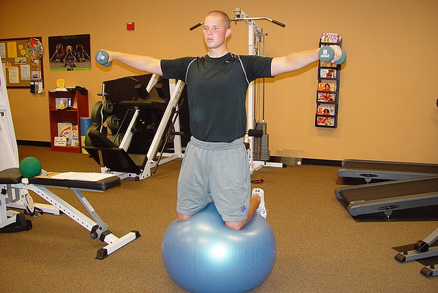 man on exercise ball