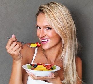 woman eating salad